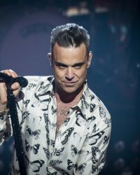 Robbie Williams : bientôt à la tête d'un nouveau groupe