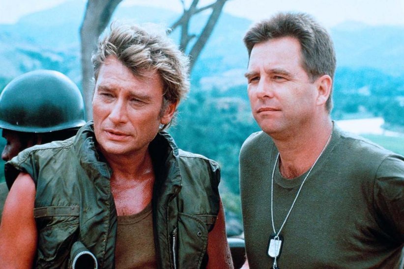 Johnny joue les soldats au Viêt Nam dans "Le Triangle de fer" (1989) Johnny joue les soldats au Viêt Nam dans "Le Triangle de fer" (1989)