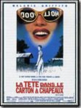 La Tête dans le carton à chapeaux