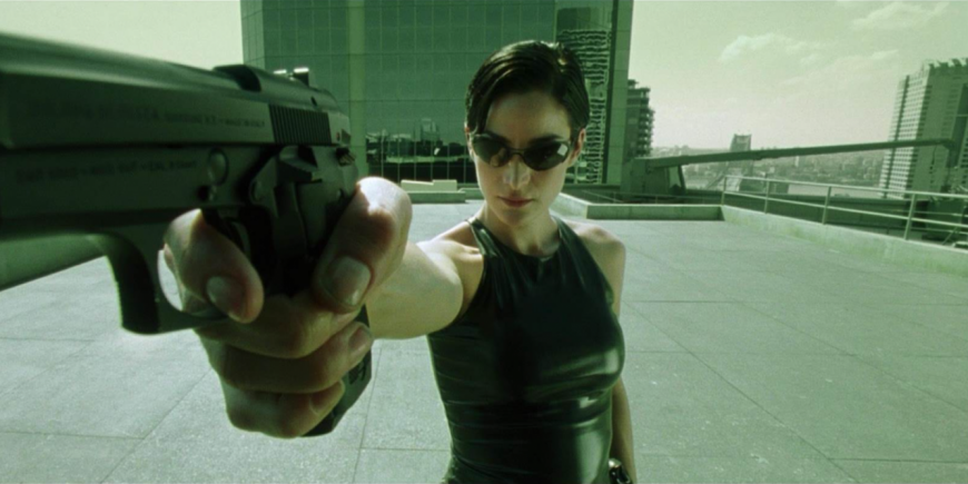 Carrie-Anne Moss en Trinity dans