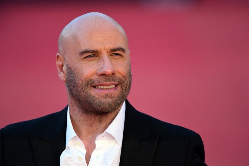 John Travolta : scientologue depuis 1975 John Travolta : scientologue depuis 1975