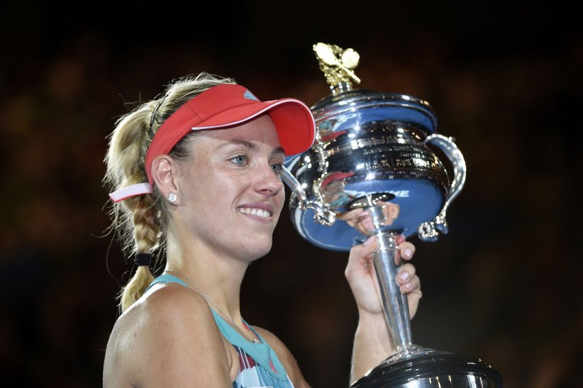 Angelique Kerber célèbre sa victoire à L'Open d'Australie le 30 janvier 2016. Angelique Kerber célèbre sa victoire à L'Open d'Australie le 30 janvier 2016.