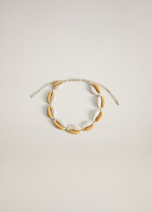 Coquillages sur jolie bracelet Coquillages sur jolie bracelet