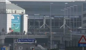 Explosions à Bruxelles: les vitres de l'aéroport brisées