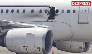 Somalie: la carlingue d'un avion se perce en plein vol