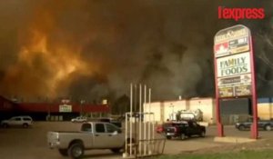 Canada: une ville de 100 000 habitants encerclée par les flammes