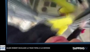 Alain Robert, le "Spiderman français" à l'assaut de la tour Total à la Défense (Vidéo)