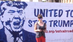 A Berlin, des militants détruisent un mur à l'effigie de Trump