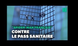 Le "Spider-man français" escalade la Tour Total à la Défense pour protester contre le pass sanitaire