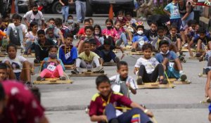 Cette course annuelle de "carruchas" fait le bonheur de ces enfants vénézuéliens