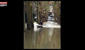 Crue de la Seine : un père et son fils en profitent pour faire du wakeboard ! (Vidéo)