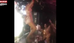 Une jeune femme veut faire une danse sexy sur un bar... (vidéo)