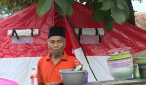 Indonésie: les survivants poursuivent leur routine deux jours après le séisme meurtrier