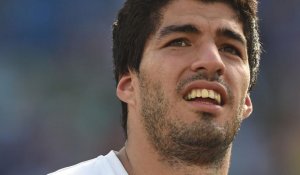L'Uruguayen Luis Suarez suspendu neuf matches pour sa morsure sur Chiellini