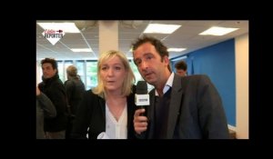 Quand Marine Le Pen rencontre le caméraman agressé lors du défilé du FN - ZAPPING ACTU DU 08/06/2015