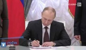 Vladimir Poutine signe le traité rattachant la Crimée à la Russie