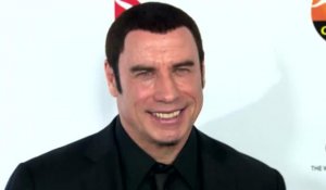 John Travolta parle de son cafouillage aux Oscars en présentant Idina Menzel