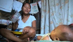 Philippines: Bea Joy, enfant du typhon, grandit face aux flots meurtriers