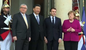 Macron, Merkel et Juncker accueillent Xi Jinping à l'Élysée