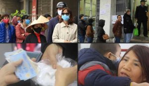 Coronavirus: des Vietnamiens font la queue pour acheter des masques