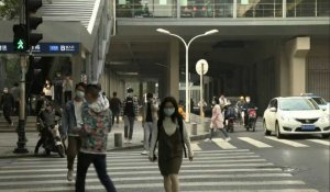 Heure de pointe à Wuhan alors que le bilan mondial des décès du coronavirus approche le million