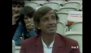 Jean Paul Belmondo et Charles Gérard dans les tribunes de Roland Garros