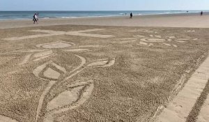Dunkerque : il dessine sur le sable de Malo en hommage aux soignants