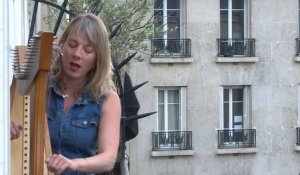 Covid-19: à Paris, de la harpe au balcon pour les voisins confinés