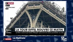 Un homme suspendu à la tour Eiffel pendant  6 heures