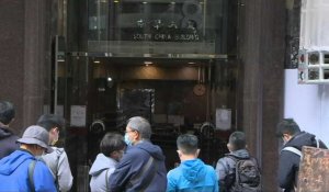 Hong Kong: devant le cabinet d'un avocat américain arrêté par la police