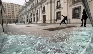 Protesters clash with police during march on eve of Pinochet coup anniversary