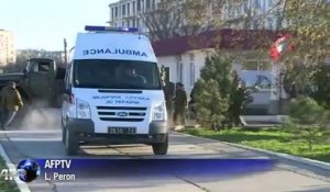 Des véhicules blindés ont pénétré samedi 22 mars dans une base ukrainienne en Crimée