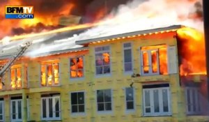 Sauvetage spectaculaire d'un ouvrier coincé sur le balcon d'un bâtiment en feu - 26/03