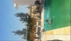 Libye :des miliciens dans la piscine d'une annexe de l'ambassade américaine