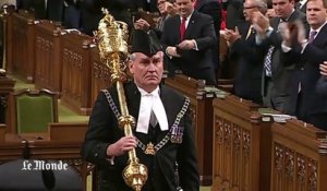 Le « héros » de la fusillade d'Ottawa acclamé au Parlement