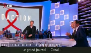 Antoine de Caunes embrasse Jean-Luc Romero au grand journal