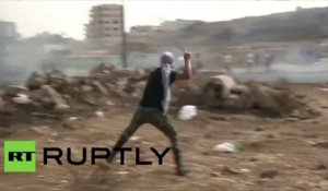 Des Palestiniens font brûler des pneus à al-Bireh