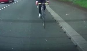 An absent-minded cyclist hits a parked car