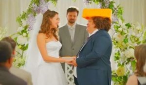 Sexy woman marries funny cheese hat man