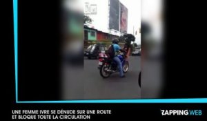 Une femme ivre se dénude sur une route et bloque toute la circulation (vidéo)