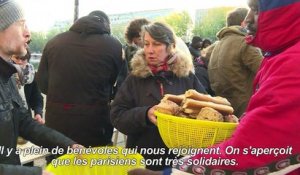 Paris: des riverains offrent le petit déjeuner aux migrants
