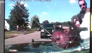 Ce flic casse la vitre de sa voiture avec la tête d’un suspect !