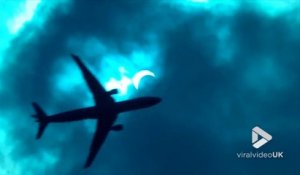 Elle confond un avion et la lune pendant l'éclipse solaire.. BRAVO