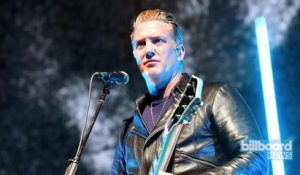 Josh Homme Issues Apology to Photographer He Kicked During Concert | Billboard News