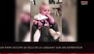 Un papa occupe son enfant en le laissant sur un aspirateur (Vidéo)