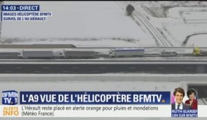Les images des camions bloqués par la neige sur l’A9 depuis l’hélicoptère BFMTV