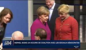 Allemagne: Angela Merkel signe un accord de coalition avec les socio-démocrates