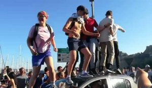 Driver Unimpressed as People Jump on His Car During World Cup Celebrations in France