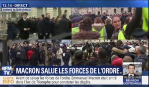 Des gilets jaunes scandent "Macron démission" à proximité du Président à Paris