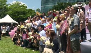 Taïwan: fête pour les premiers mariages homosexuels d'Asie
